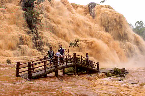 Tourists visit Thirathgarh Falls